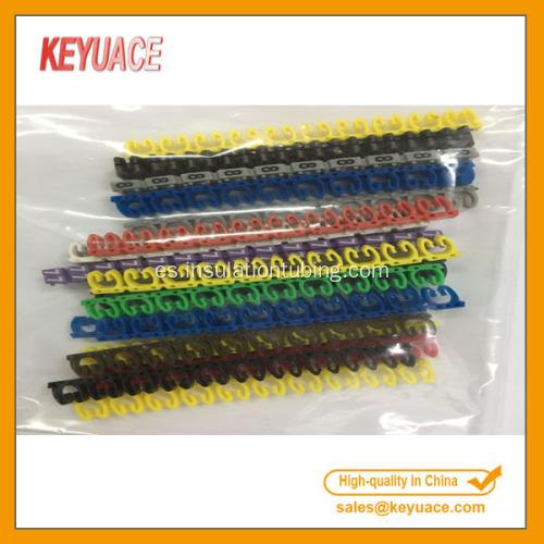 Clip plástico colorido en marcadores de cable